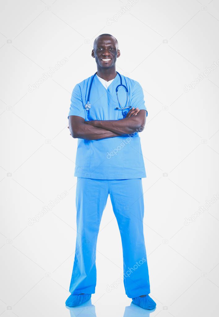 Portrait of a doctor man standing isolated on white background. Doctor. Clinic