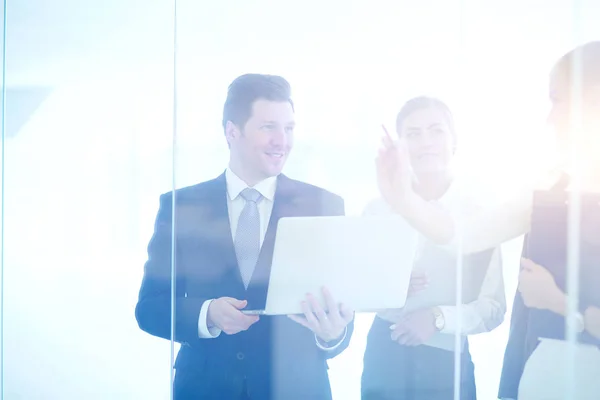 Group of business people doing presentation with laptop during meeting. Group of business people — Stock Photo, Image