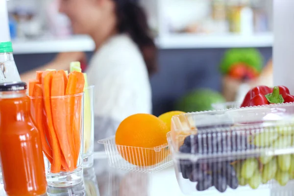 Open refrigerator with fresh fruits and vegetable. Open refrigerator — Stock Photo, Image