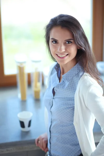 Happy woman drinking tea in the kitchen at home. Woman at home — Stock Photo, Image