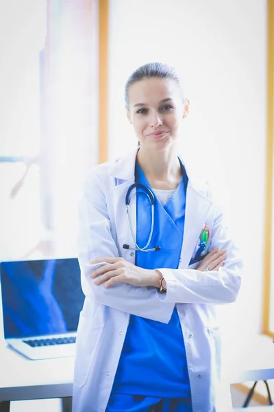 Woman doctor standing near window at hospital. Woman doctor — Stock Photo, Image