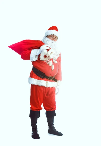 Echte santa claus grote draagtas vol geschenken, geïsoleerd op witte achtergrond — Stockfoto