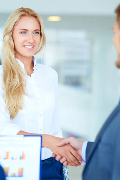 Two successful business people shaking hands with each other. Two successful business people — Stock Photo, Image