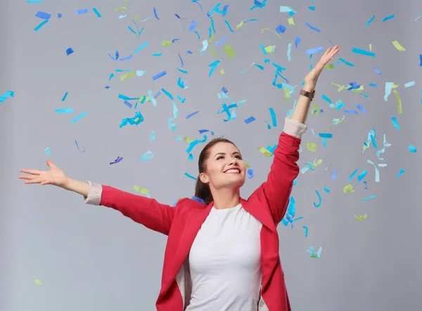 Beautiful happy woman at celebration party with confetti .Birthday or New Year eve celebrating concept — Stock Photo, Image