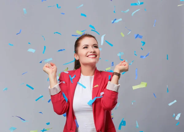 Beautiful happy woman at celebration party with confetti .Birthday or New Year eve celebrating concept — Stock Photo, Image