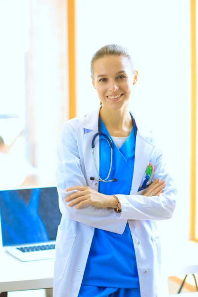 Woman doctor standing near window at hospital. Woman doctor — Stock Photo, Image