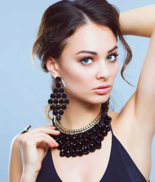Portrait of a beautiful woman with necklace — Stock Photo, Image