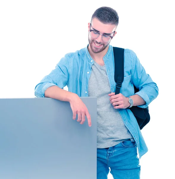 Retrato de un estudiante sonriente sosteniendo tablero en blanco — Foto de Stock