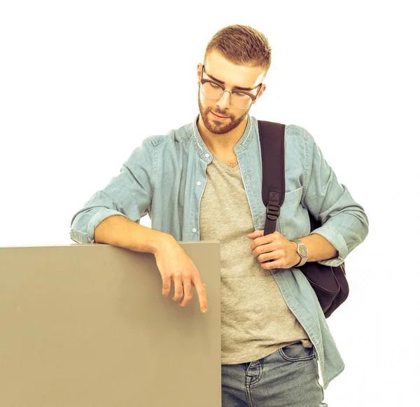 Porträtt av en leende manlig student håller Tom styrelsen — Stockfoto