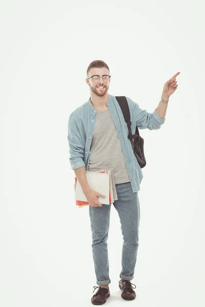 一位男同学书包拿着书在白色背景上分离。教育机会。大学生. — 图库照片