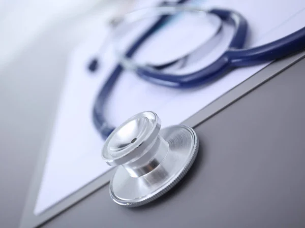 Medical equipment: blue stethoscope and tablet on white background. Medical equipment — Stock Photo, Image