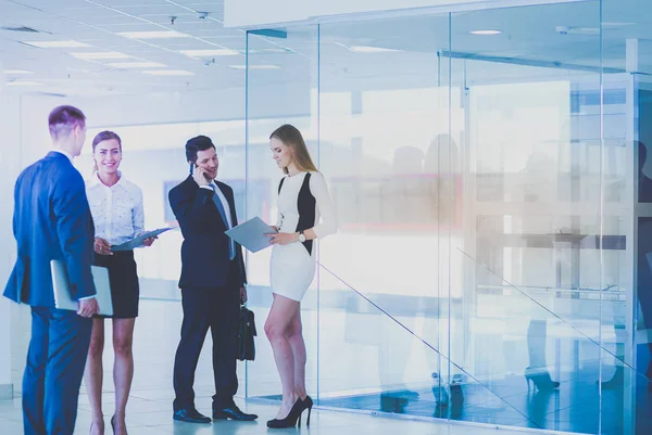 Group of business people doing presentation with laptop during meeting. Group of business people