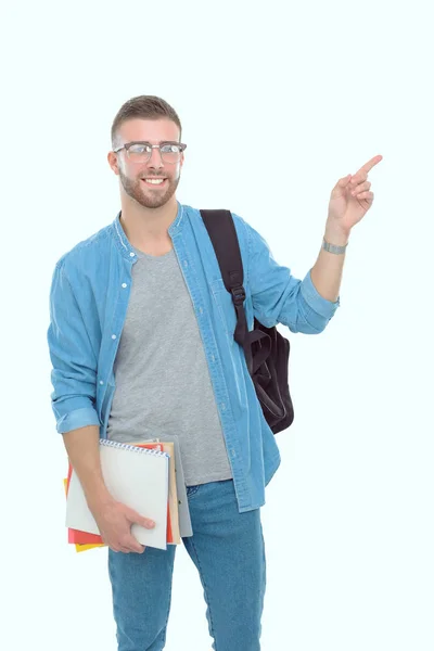 Muž student s školní batoh drží knihy izolovaných na bílém pozadí. Vzdělávání – příležitosti. Vysokoškolský student. — Stock fotografie