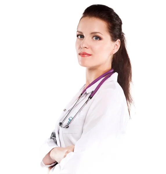 Portret van jonge vrouw arts met witte vacht staande — Stockfoto