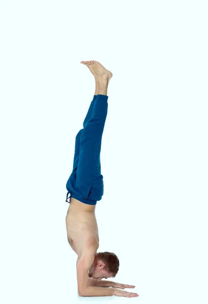 Adult man doing exercise on white background — Stock Photo, Image