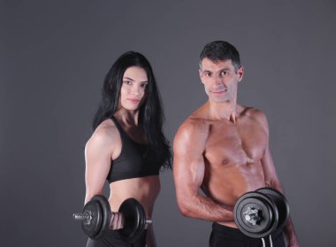 Dambılı atletik erkek ve kadın