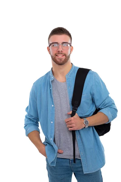 Een mannelijke student met een schooltas boeken geïsoleerd op een witte achtergrond te houden. Onderwijsaanbod. College student. — Stockfoto