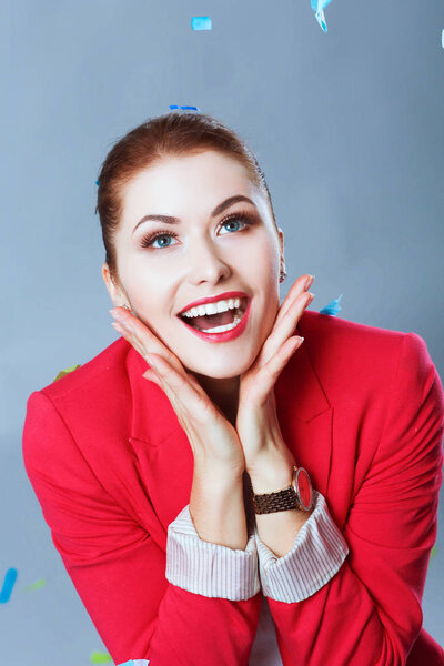 Portreit beautiful happy woman at celebration party with confetti .Birthday or New Year eve celebrating concept.