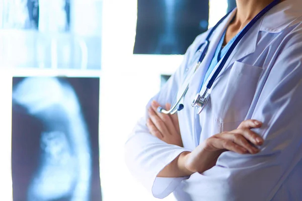 Image of attractive woman doctor looking at x-ray results. — Stock Photo, Image