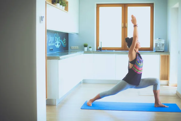 Asian woman are yoga exercises at home. Woman. Yoga.