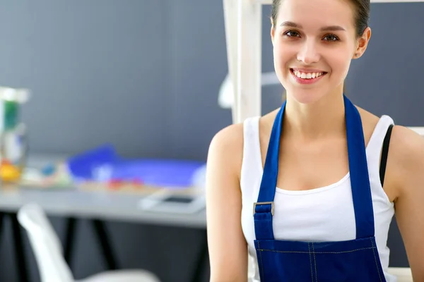 Young woman portrait while standing new apartment — Stock Photo, Image