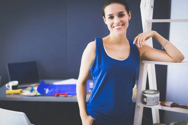 Young woman portrait while standing new apartment — Stock Photo, Image