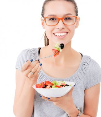 Sağlıklı yemek yiyen güzel bir kız. Güzel kız.