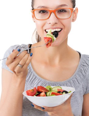 Sağlıklı yemek yiyen güzel bir kız. Güzel kız.