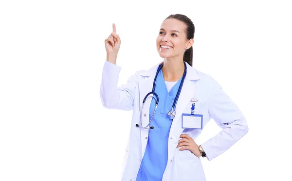 Beautiful young woman in white coat posing with hand in pocket. Woman doctor — Stock Photo, Image