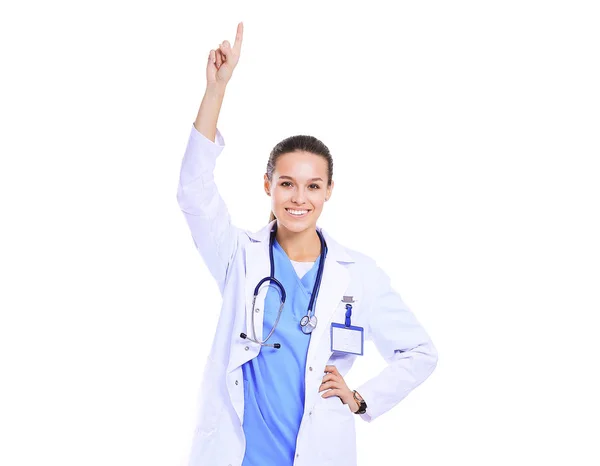 Beautiful young woman in white coat posing with hand in pocket. Woman doctor — Stock Photo, Image