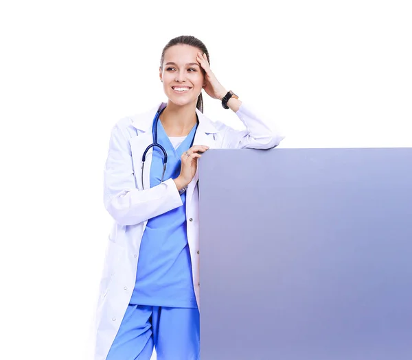 A female doctor with a blank billboard. Woman doctor — Stock Photo, Image