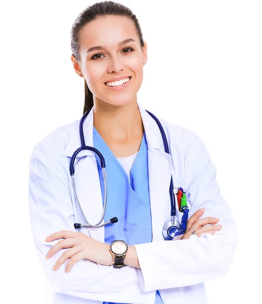 Beautiful young woman in white coat posing with hand in pocket. Woman doctor — Stock Photo, Image