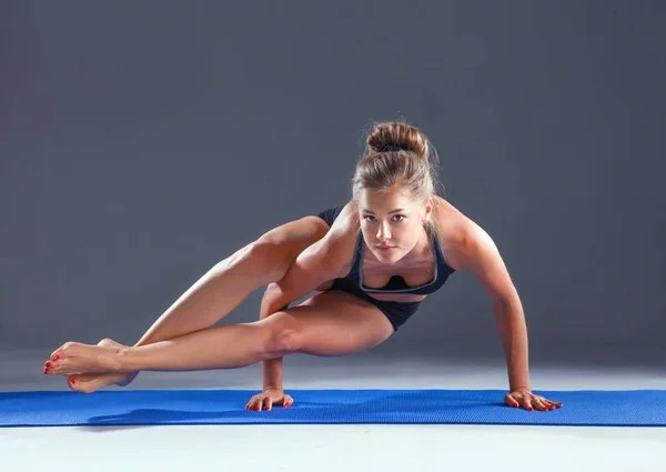 Portrait of sport girl doing yoga stretching exercise . yoga — Stock Photo, Image