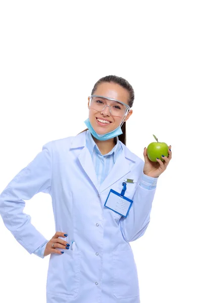 Dentist medical doctor woman hold green fresh apple in hand and tooth brush. Dentist doctors. Woman doctors — Stock Photo, Image