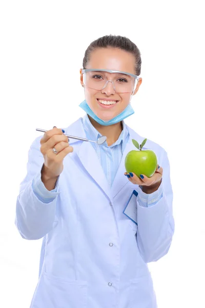 Dentist medical doctor woman hold green fresh apple in hand and tooth brush. Dentist doctors. Woman doctors — Stock Photo, Image