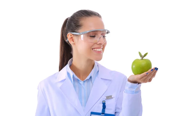 Mulher sorridente doutor com uma maçã verde. Mulher médica — Fotografia de Stock