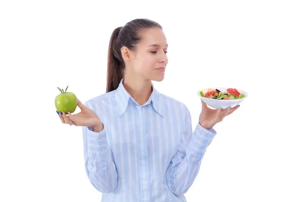 Retrato de una hermosa doctora sosteniendo un plato con verduras frescas y manzana verde. Mujer doctora —  Fotos de Stock