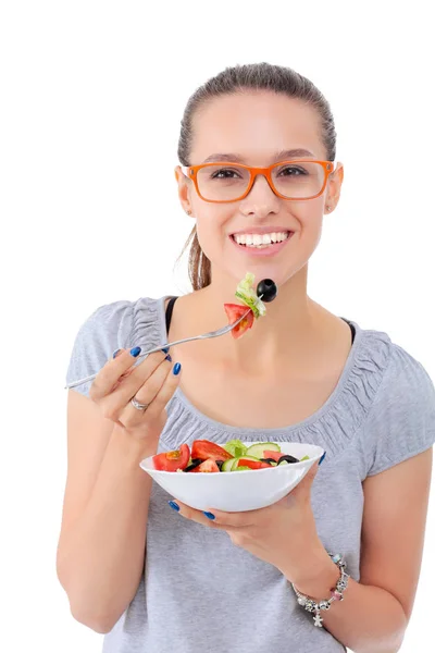 Uma linda garota comendo comida saudável. Menina bonita — Fotografia de Stock