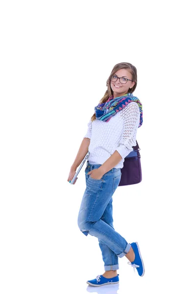 Usmívající se teenager s notebookem na bílém pozadí. Studentka. — Stock fotografie