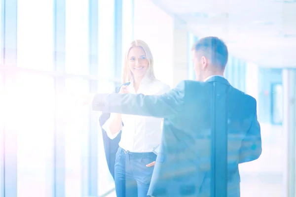 Smiling successful business team standing in office . business — Stock Photo, Image