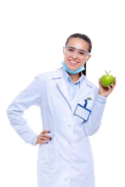 Dentist medical doctor woman hold green fresh apple in hand and tooth brush. Dentist doctors. Woman doctors — Stock Photo, Image