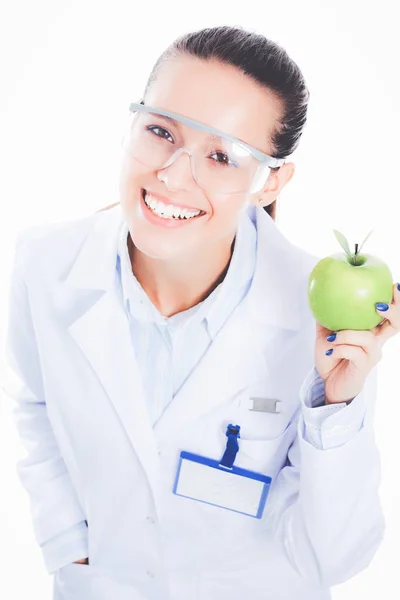 Fogorvos orvos nő tartja zöld friss alma a kezében és fogkefe. Fogorvos vagyok. Női orvosok — Stock Fotó