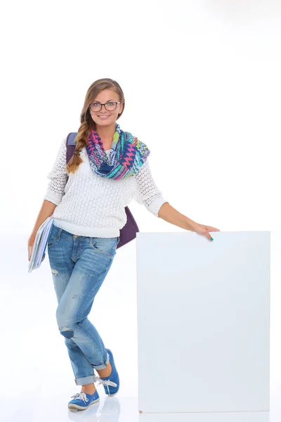 Hermosa estudiante señalando en el tablero en blanco. Estudiante . —  Fotos de Stock