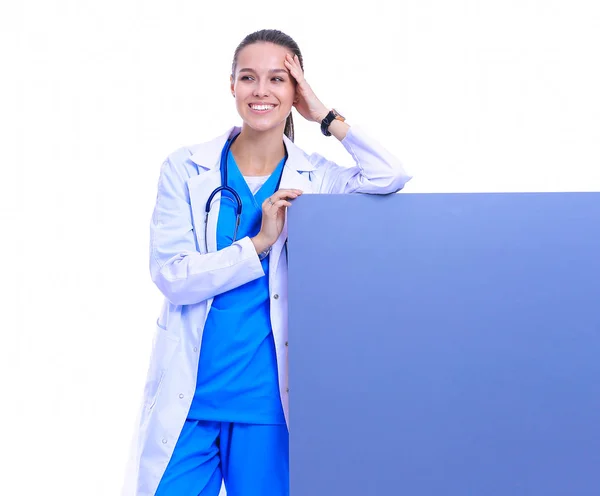 A female doctor with a blank billboard. Woman doctor — Stock Photo, Image