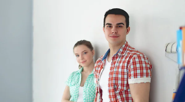 Portrait of young couple moving in new home. Young couple — Stock Photo, Image