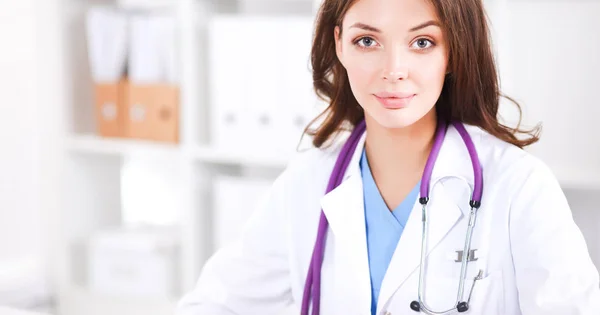 Beautiful caucasian nurse with stethoscope on white background — Stock Photo, Image