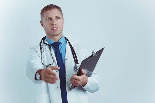 Friendly male doctor with open hand ready for hugging — Stock Photo, Image