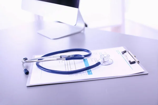 Medical equipment: blue stethoscope and tablet on white background. Medical equipment — Stock Photo, Image