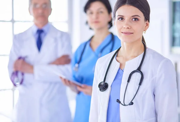 Group of doctors and nurses standing in the hospital Accident and Emergency department — Stock Photo, Image