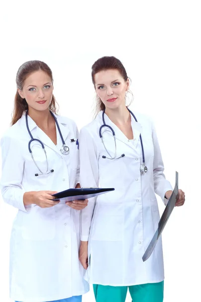 Δύο γυναίκα νοσοκόμα βλέποντας εικόνα ακτίνων Χ, μόνιμη σε νοσοκομείο. Ακτίνων Χ. Δύο γυναίκα γιατρός — Φωτογραφία Αρχείου